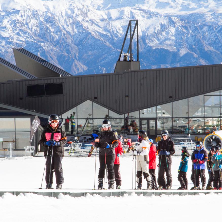 Beginners enjoying spring snow and sunshine at The Remarkables Queenstown media