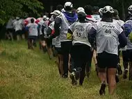 Teams on the 2k run to the kayak