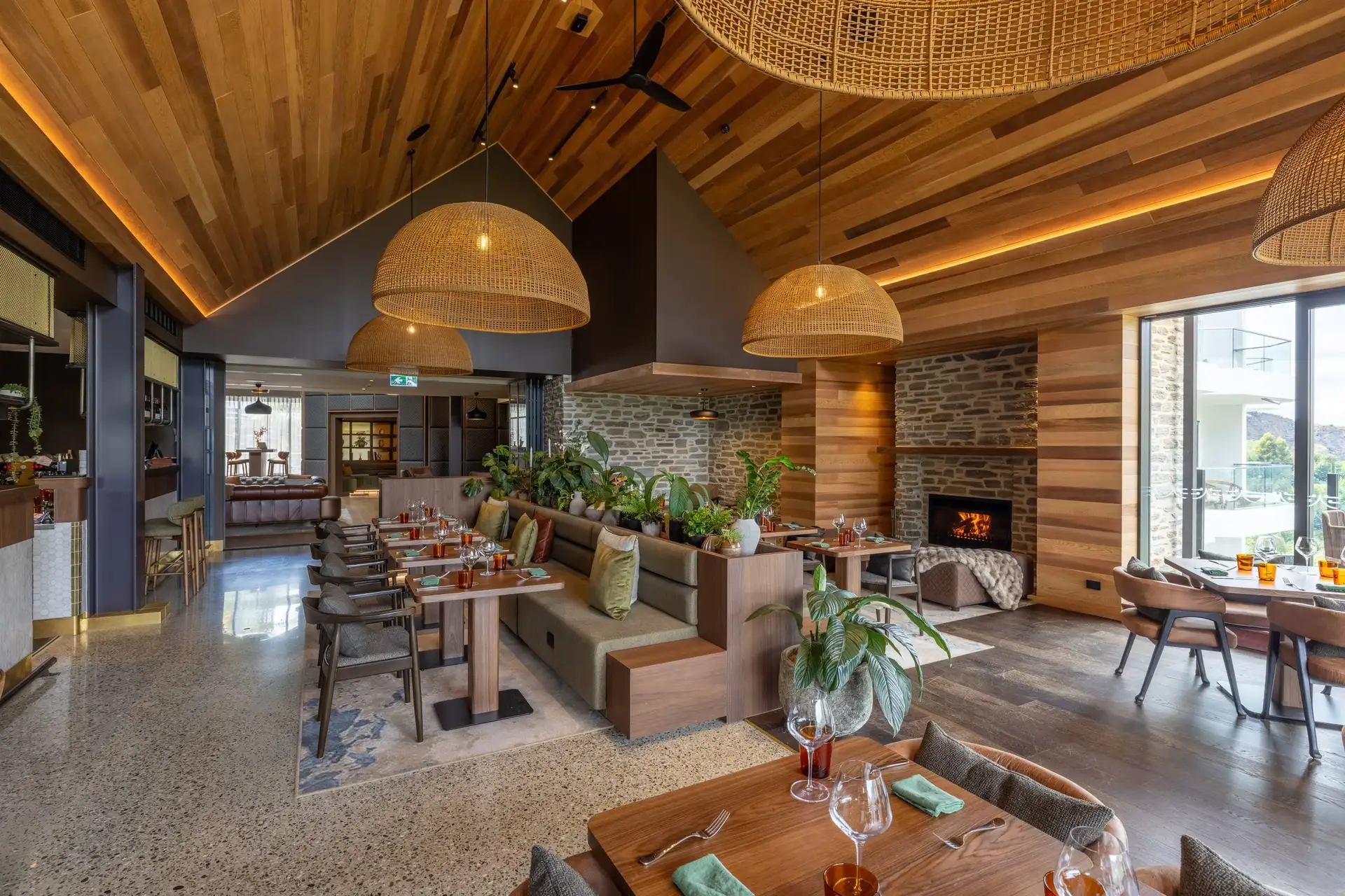 Interior of Elevation Bar & Restaurant with warm timber design and alpine lodge atmosphere