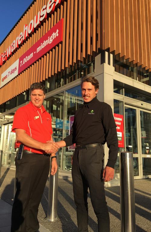 Five Mile Centre Manager Eric Nauta welcomes The Warehouse store manager Mark Dooley to the centre in Queenstown 